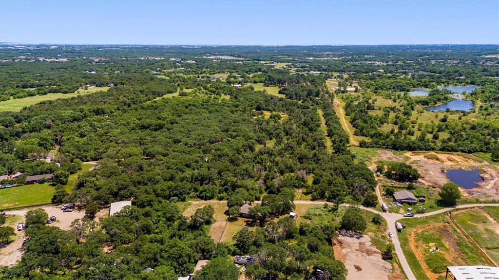 7578 Dick Price Road Mansfield, TX 76063 - Photo 36 of 40 an aerial view of residential houses with outdoor space and trees