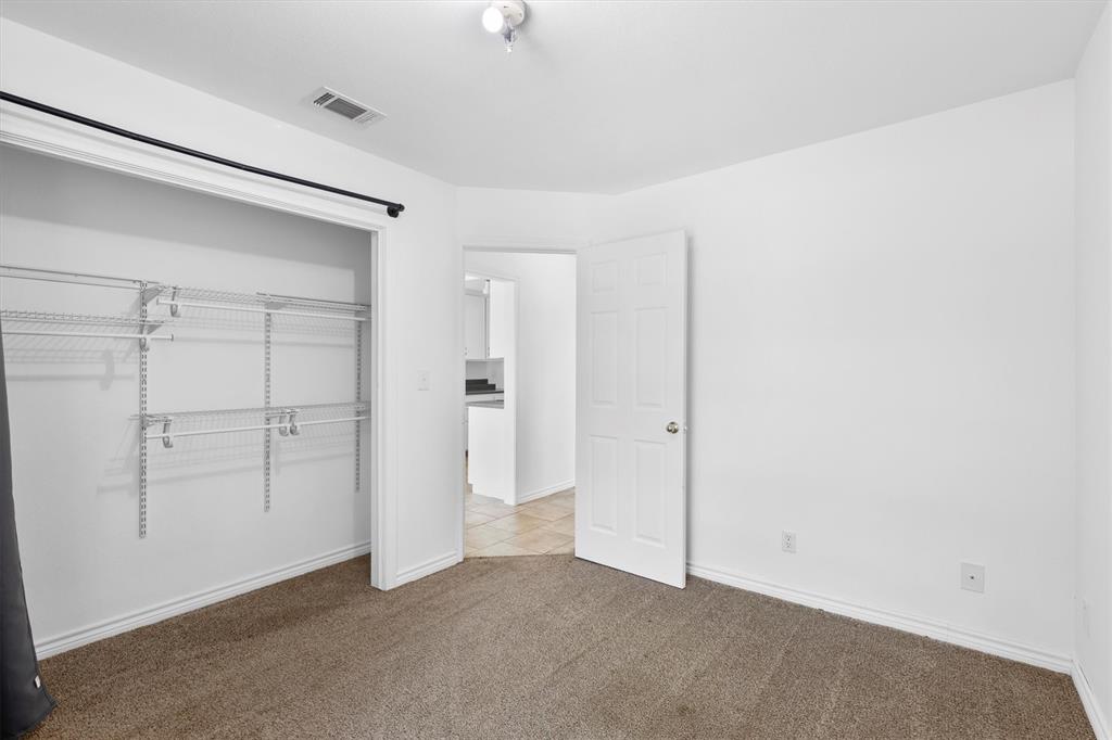 7578 Dick Price Road Mansfield, TX 76063 - Photo 6 of 40 an empty room with closet