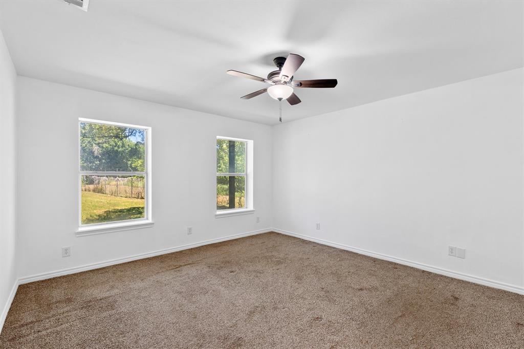 7578 Dick Price Road Mansfield, TX 76063 - Photo 10 of 40 a view of an empty room with a window