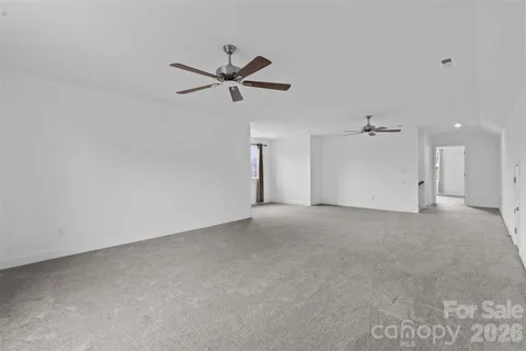 a view of a house with a big yard