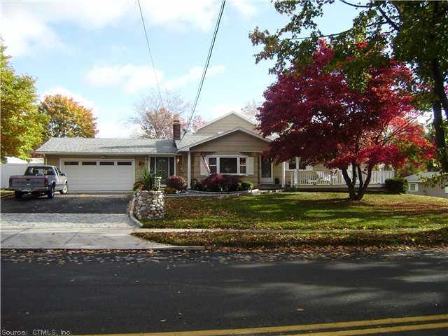 321 Woodruff Road Milford, CT 06461 - Photo 1 of 1 Exterior Front. Like two houses in one, ample parking, stone pillars.