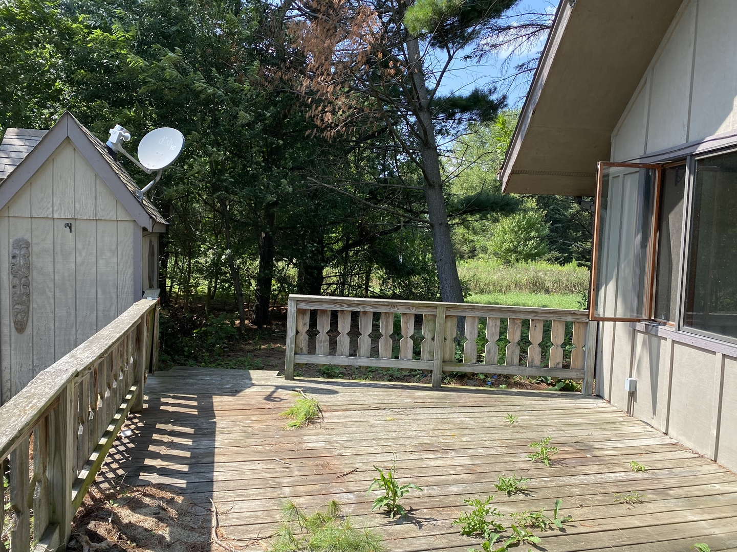 19209 Altenburg Road Harvard, IL 60033 - Photo 12 of 13 a view of balcony with wooden floor and fence
