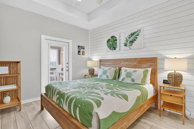 a bedroom with a bed and a table in it