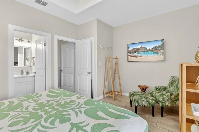 a view of a chair and table in the balcony