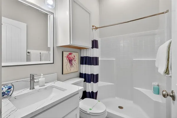 a potted plant sitting in front of a house