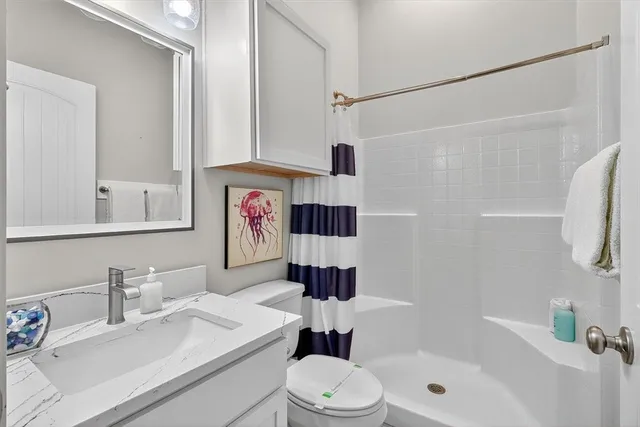 a potted plant sitting in front of a house