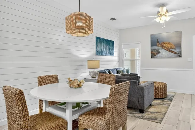 a view of a dining room with furniture