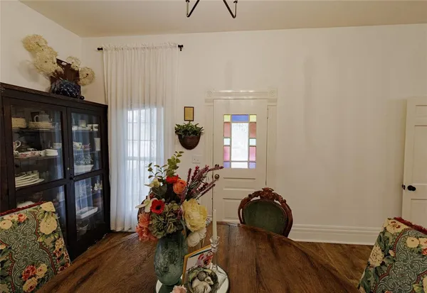 a room with furniture and wooden floor