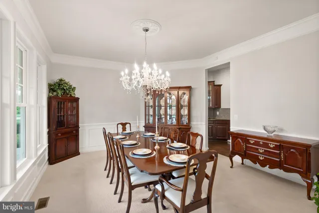 a view of entryway with wooden floor and stairs