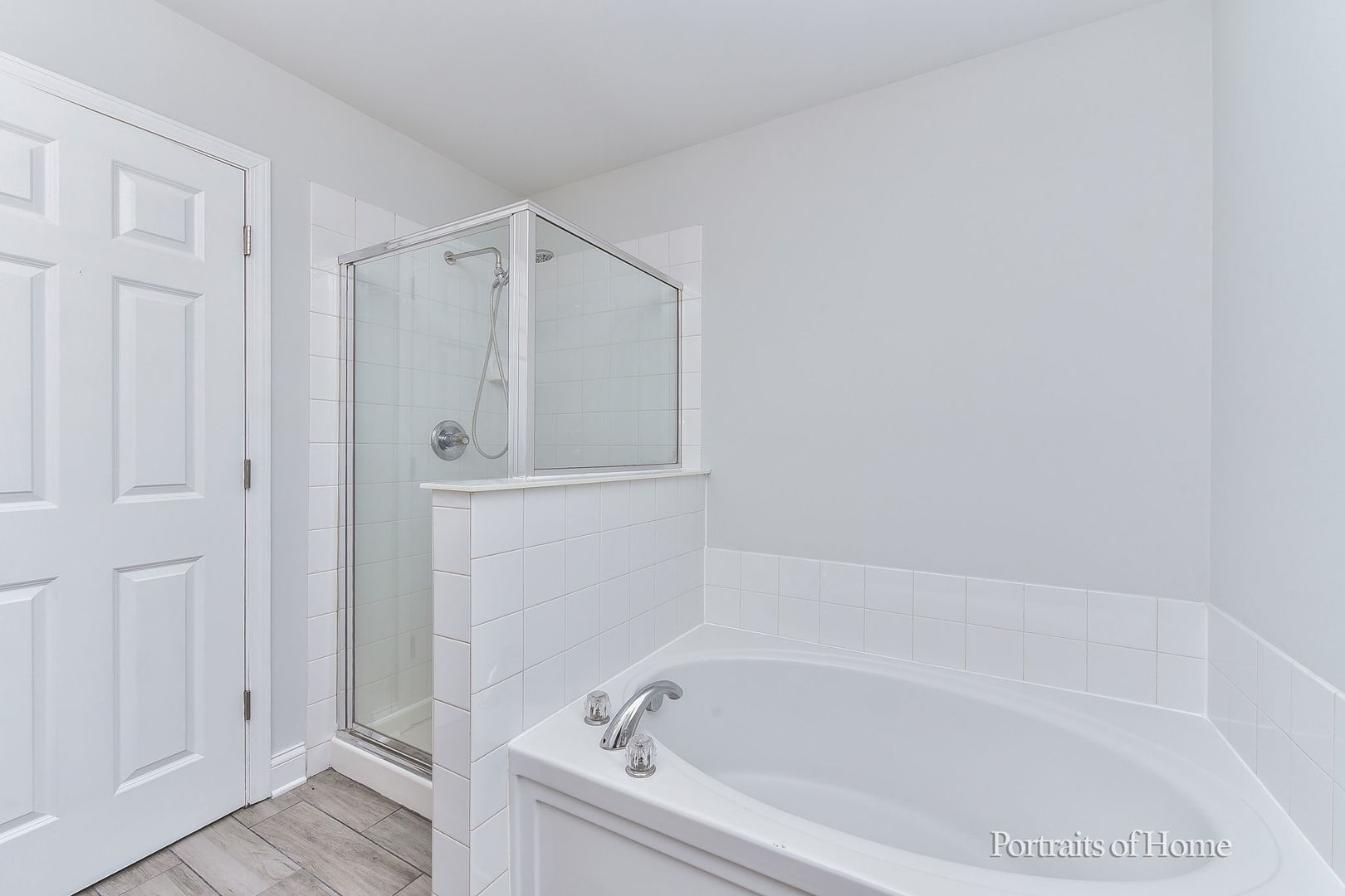 1412 Colaric Court Joliet, IL 60431 - Photo 17 of 25 a white bath tub sitting next to a shower