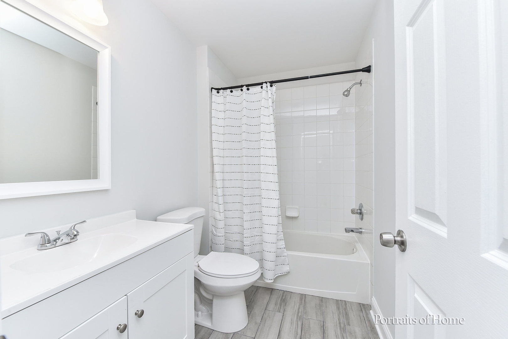 1412 Colaric Court Joliet, IL 60431 - Photo 21 of 25 a bathroom with a sink a toilet and a bathtub