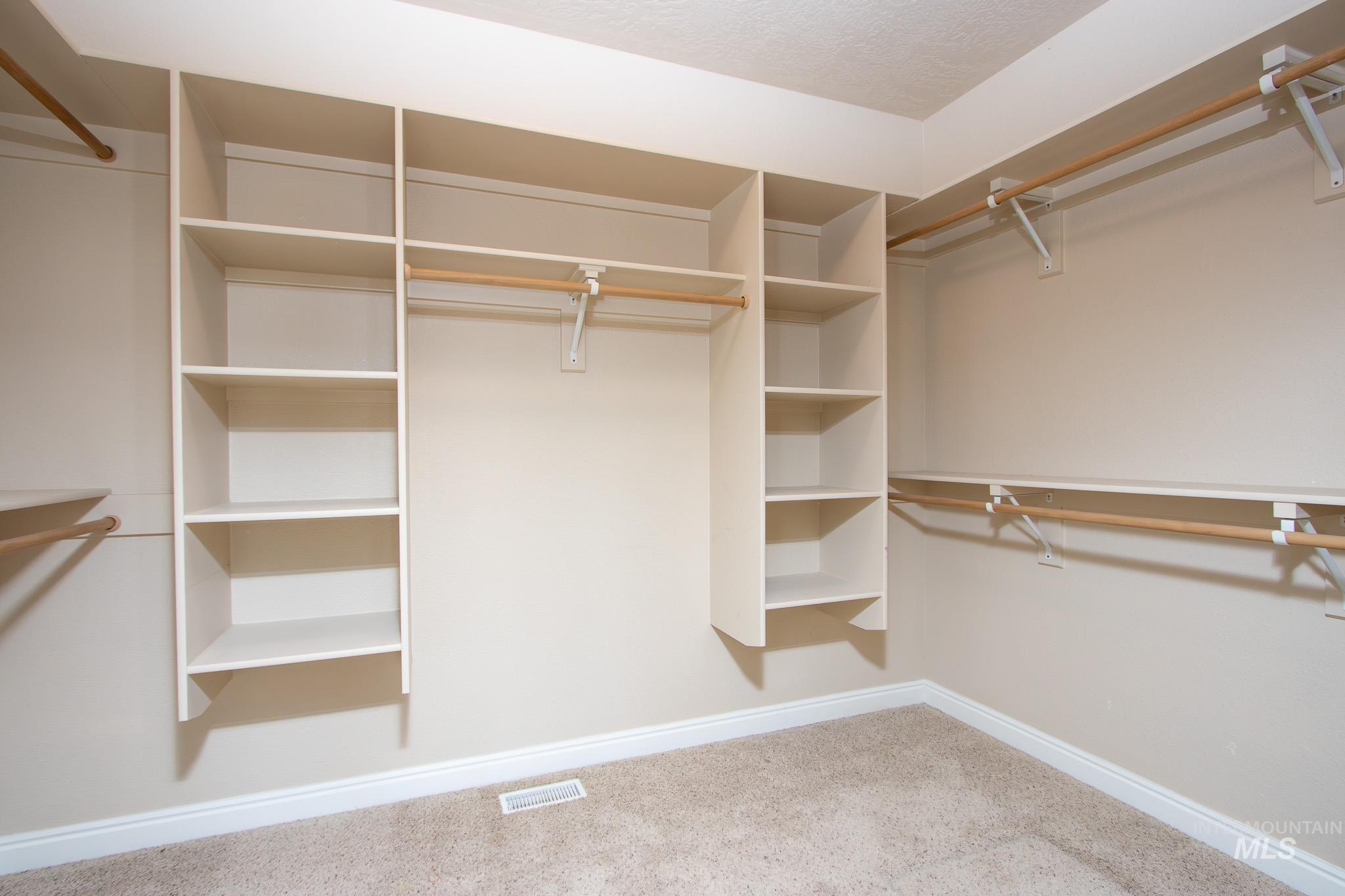 13569 Midway Road Nampa, ID 83651 - Photo 14 of 25 Spacious closet featuring carpet