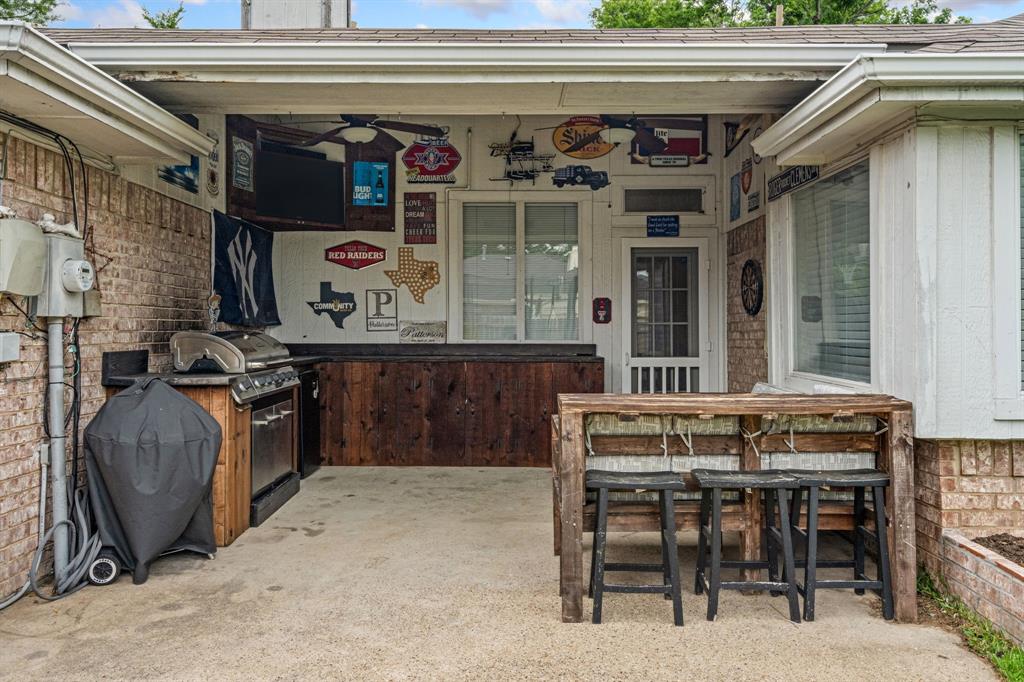 2302 Randi Road Rowlett, TX 75088 - Photo 25 of 33 a view of a chairs and table in a patio