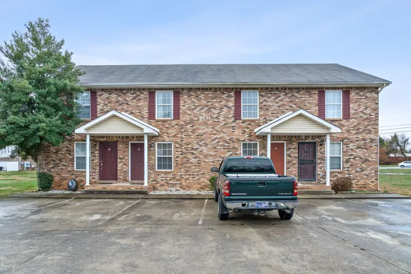 a car parked in front of a house