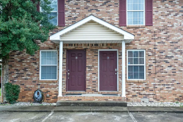 a front view of a stone house
