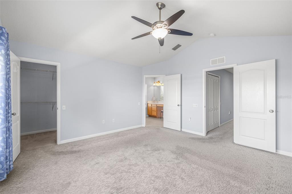 4921 Pond Ridge Drive Riverview, FL 33578 - Photo 17 of 40 an empty room with fan and entrance
