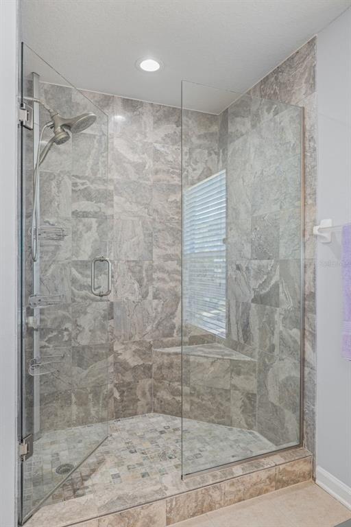 4921 Pond Ridge Drive Riverview, FL 33578 - Photo 20 of 40 a bathroom with a shower