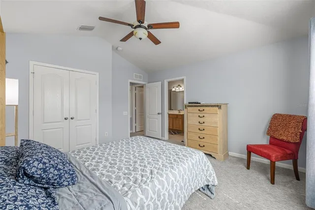 a bedroom with a bed and furniture