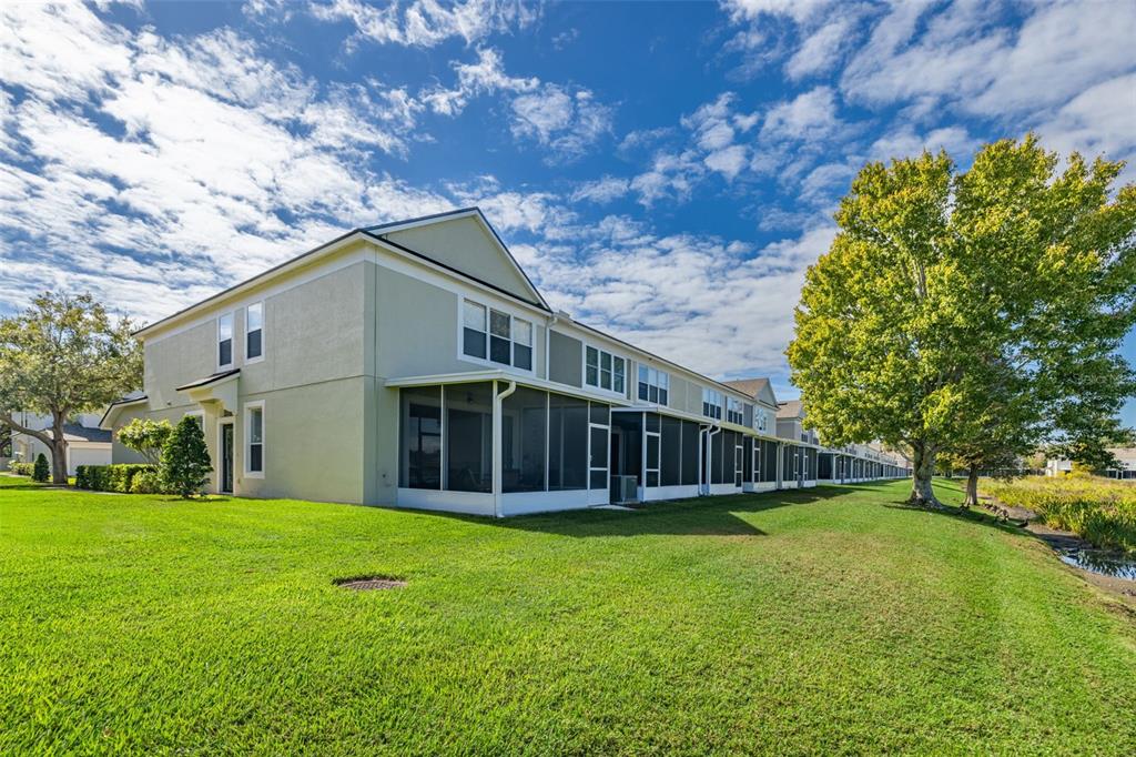 4921 Pond Ridge Drive Riverview, FL 33578 - Photo 28 of 40 a view of a house with a yard and sitting area