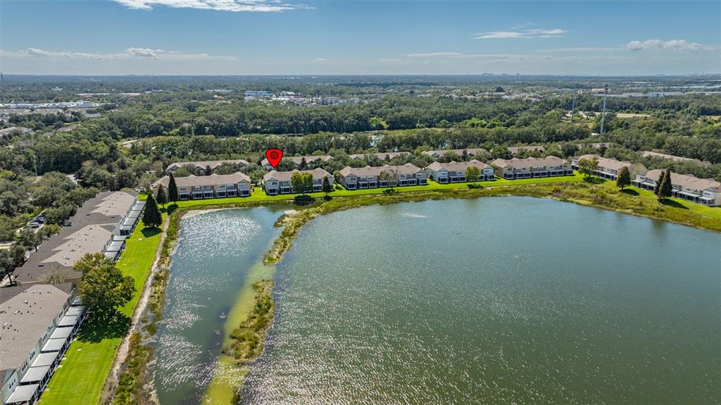 4921 Pond Ridge Drive Riverview, FL 33578 - Photo 34 of 40 an aerial view of a house with a swimming pool yard and outdoor seating