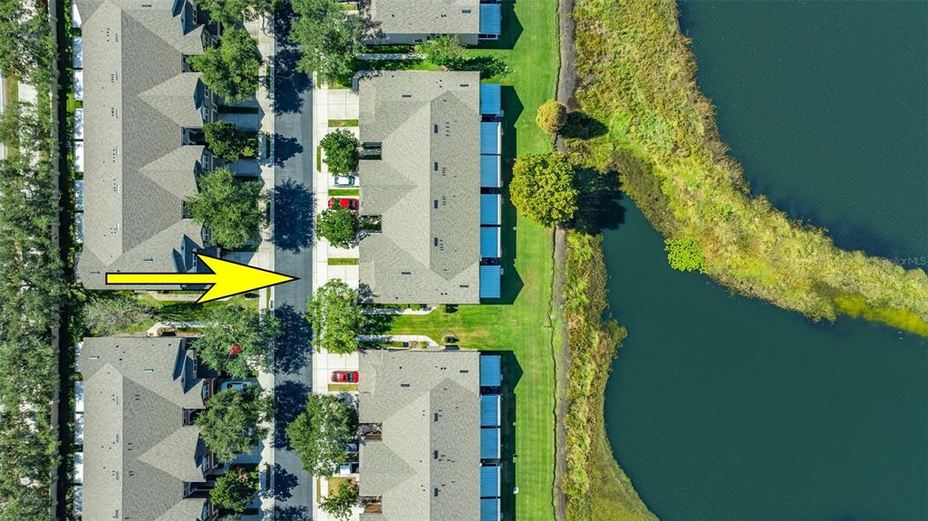 4921 Pond Ridge Drive Riverview, FL 33578 - Photo 37 of 40 an aerial view of a house with swimming pool and garden space