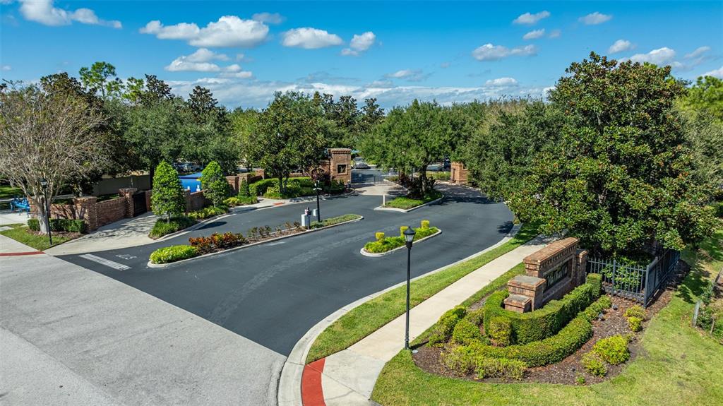 4921 Pond Ridge Drive Riverview, FL 33578 - Photo 38 of 40 swimming pool with seating space and trees in the background