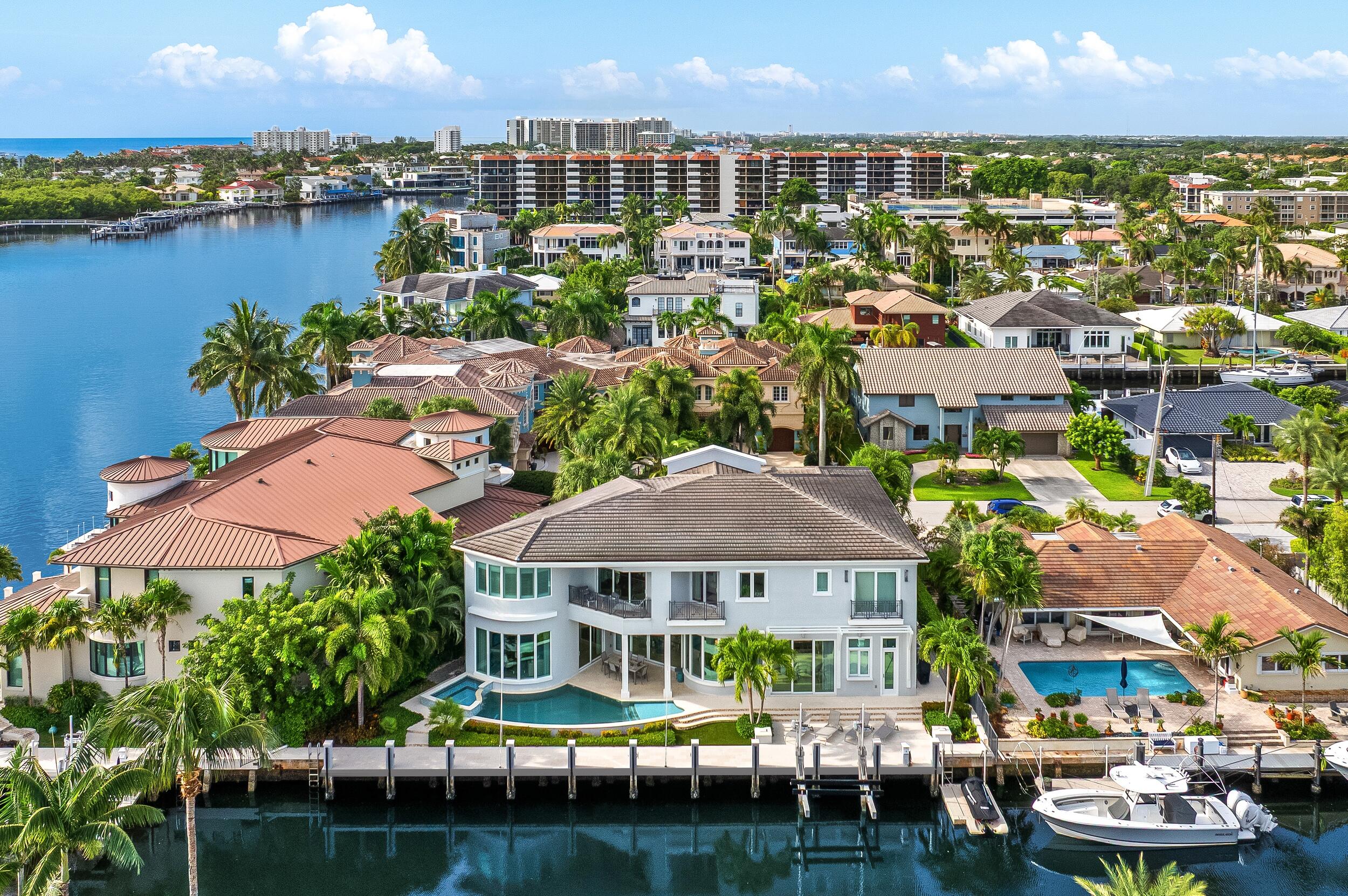 863 Enfield Street Boca Raton, FL 33487 - Photo 1 of 69 a view of a lake with a city and lake view