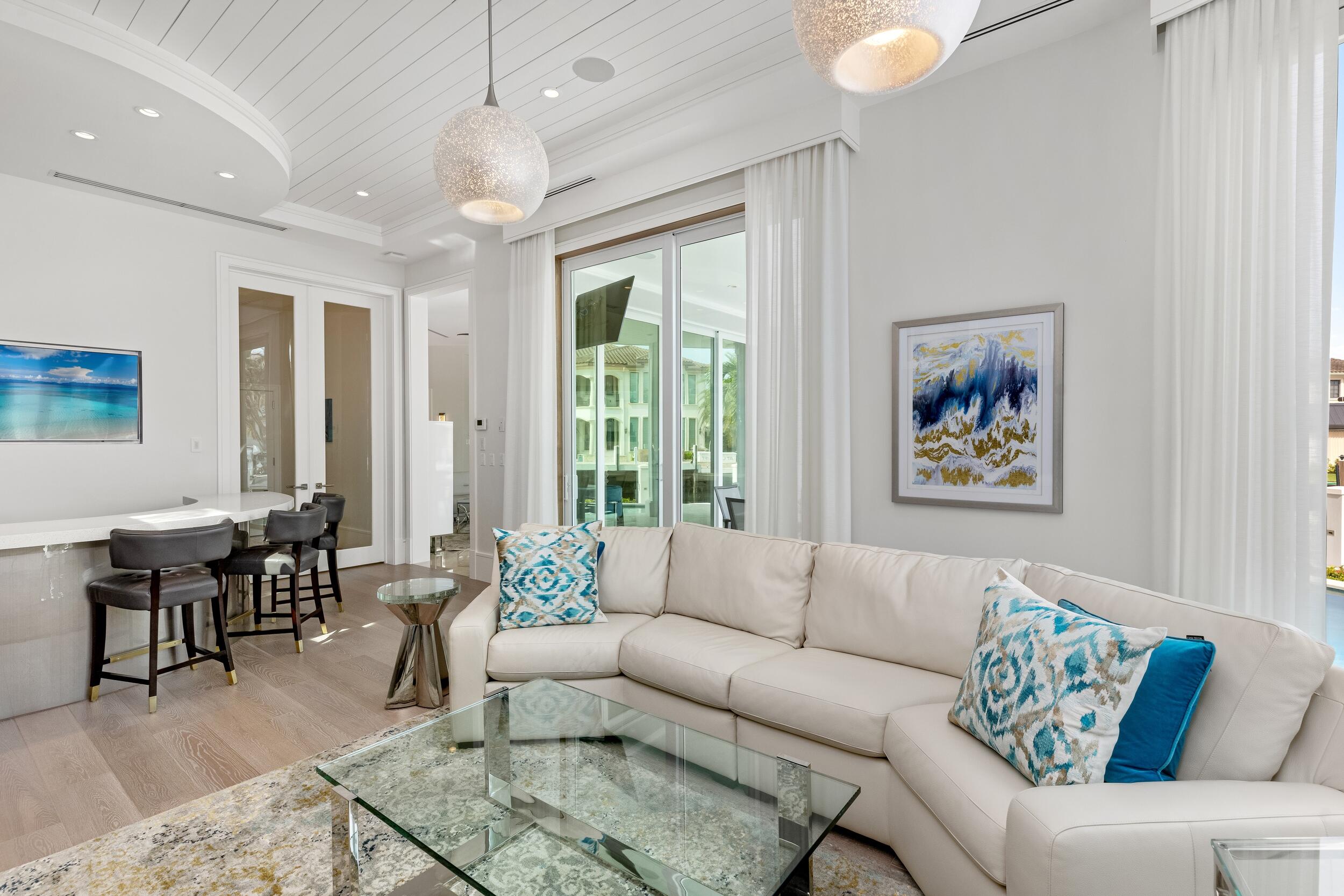 863 Enfield Street Boca Raton, FL 33487 - Photo 13 of 69 a living room with furniture and a large window