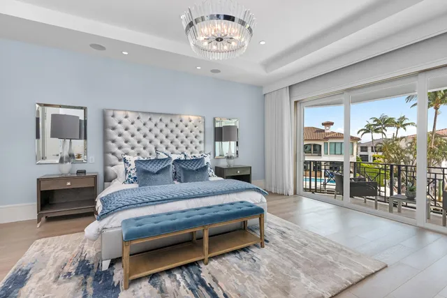 a bathroom with a sink toilet vanity and window