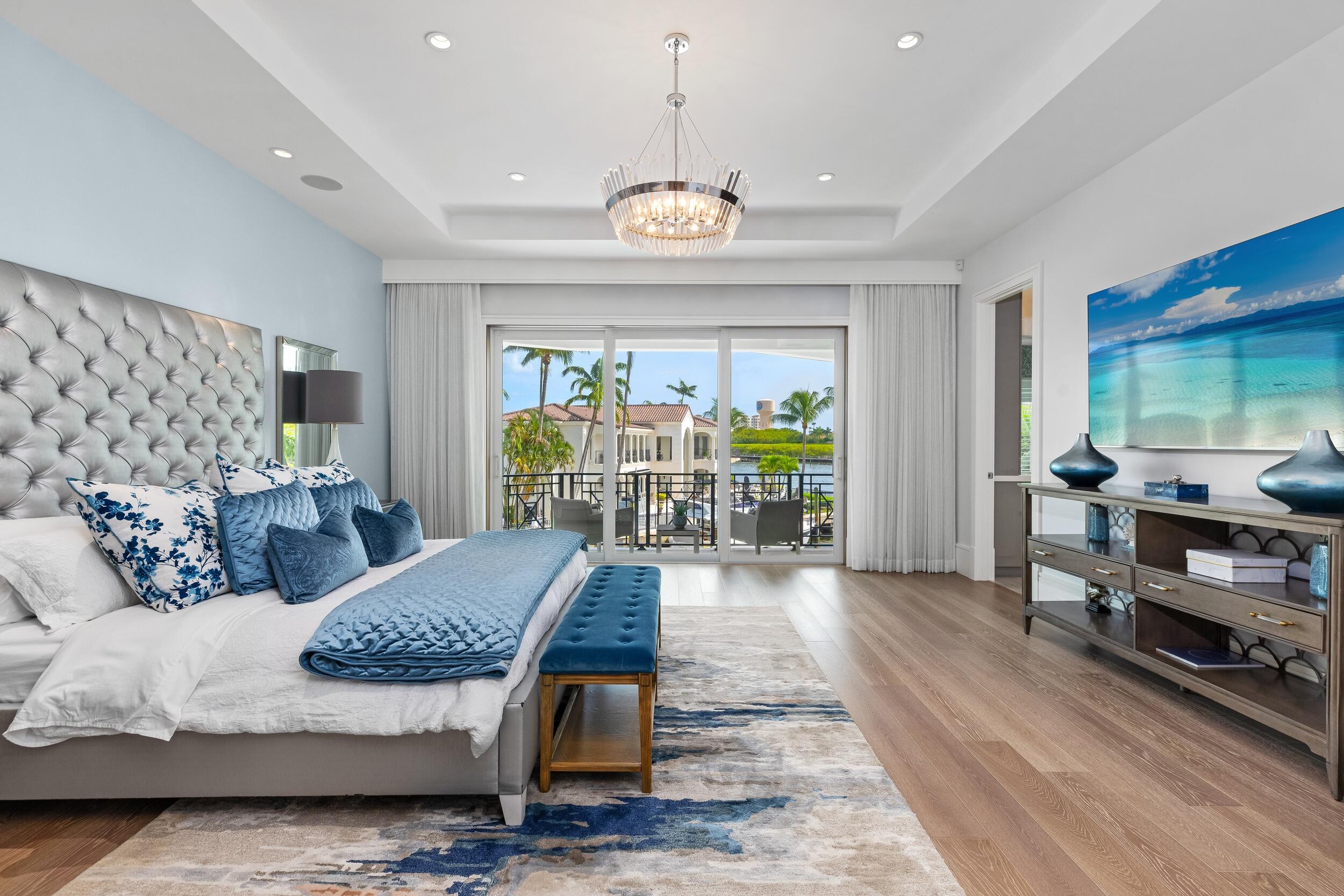 863 Enfield Street Boca Raton, FL 33487 - Photo 42 of 69 a living room with furniture a chandelier and a table