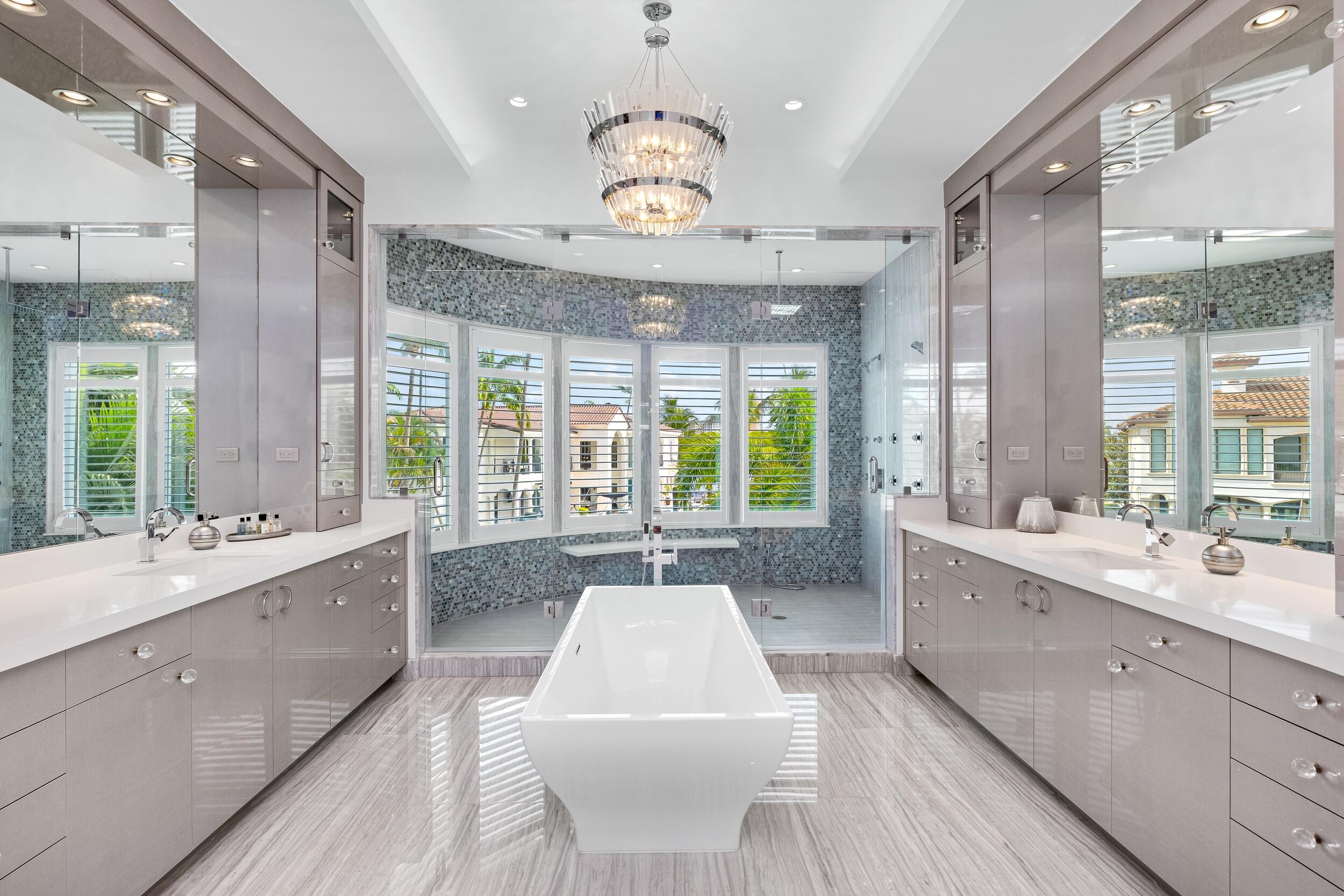 863 Enfield Street Boca Raton, FL 33487 - Photo 44 of 69 a large white kitchen with a large window