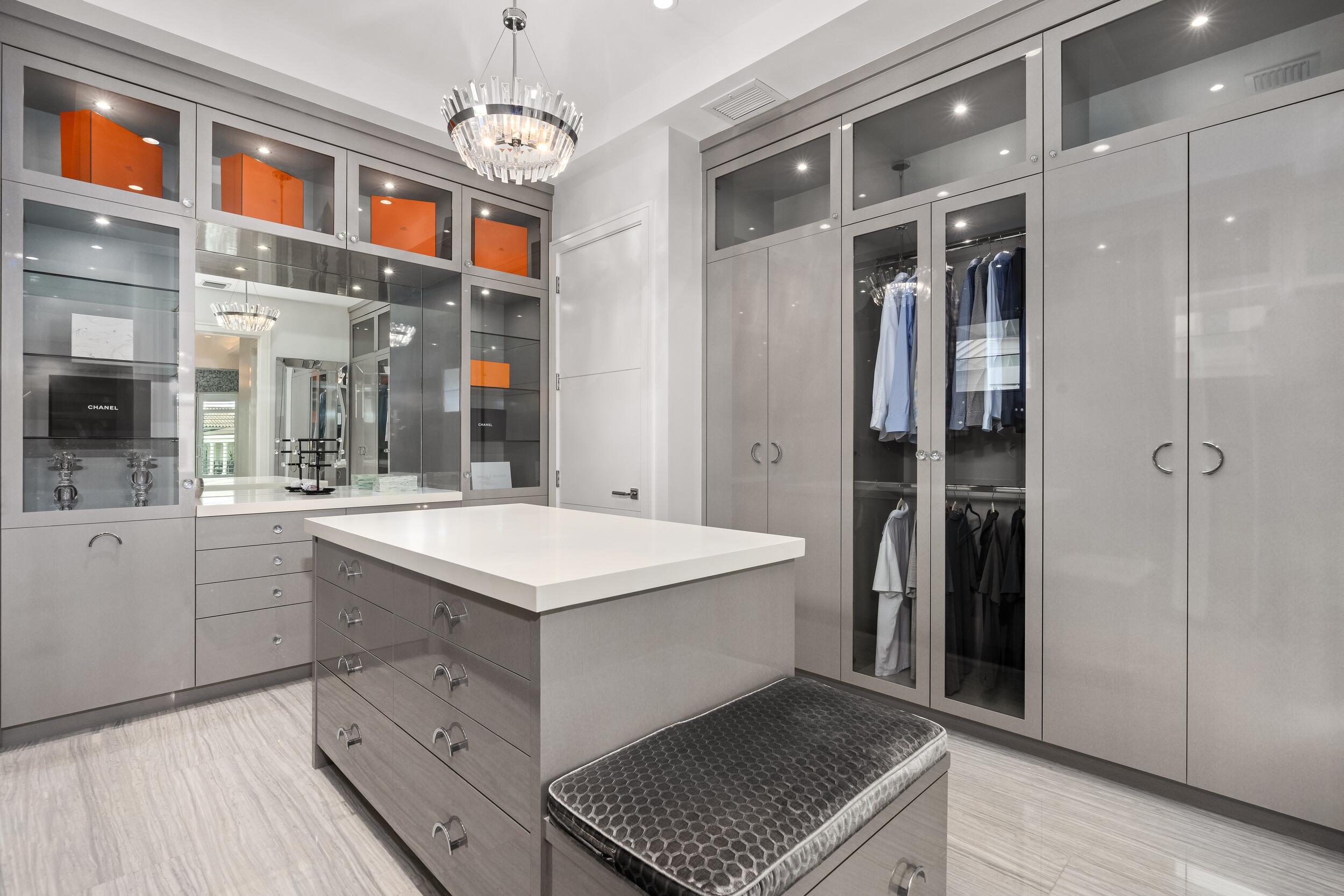 863 Enfield Street Boca Raton, FL 33487 - Photo 49 of 69 a kitchen with a sink a refrigerator and cabinets