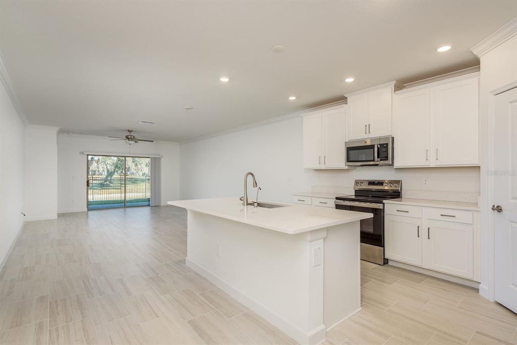 10728 Gable Dig Loop San Antonio, FL 33576 - Photo 3 of 28