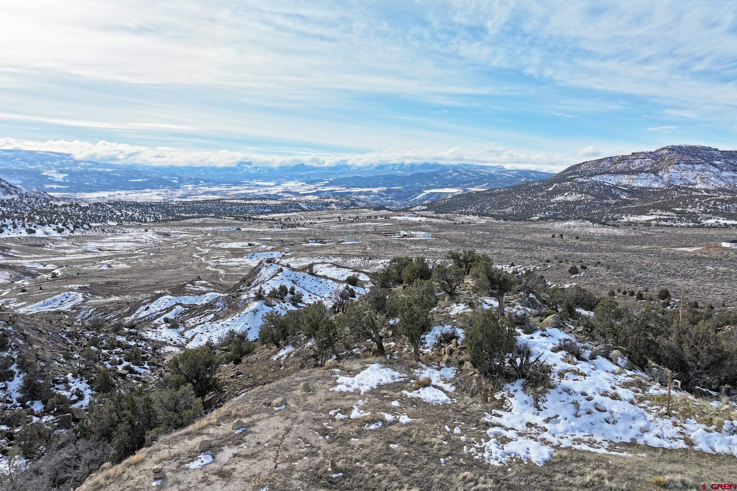 15086 45 45 1/2 Road De Beque, CO 81630 - Photo 14 of 40 an aerial view of residential house and mountains