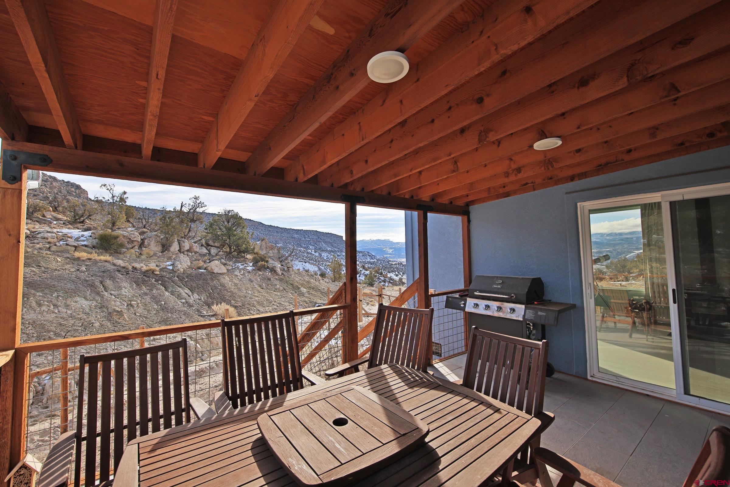 15086 45 45 1/2 Road De Beque, CO 81630 - Photo 18 of 40 a view of a balcony with chairs