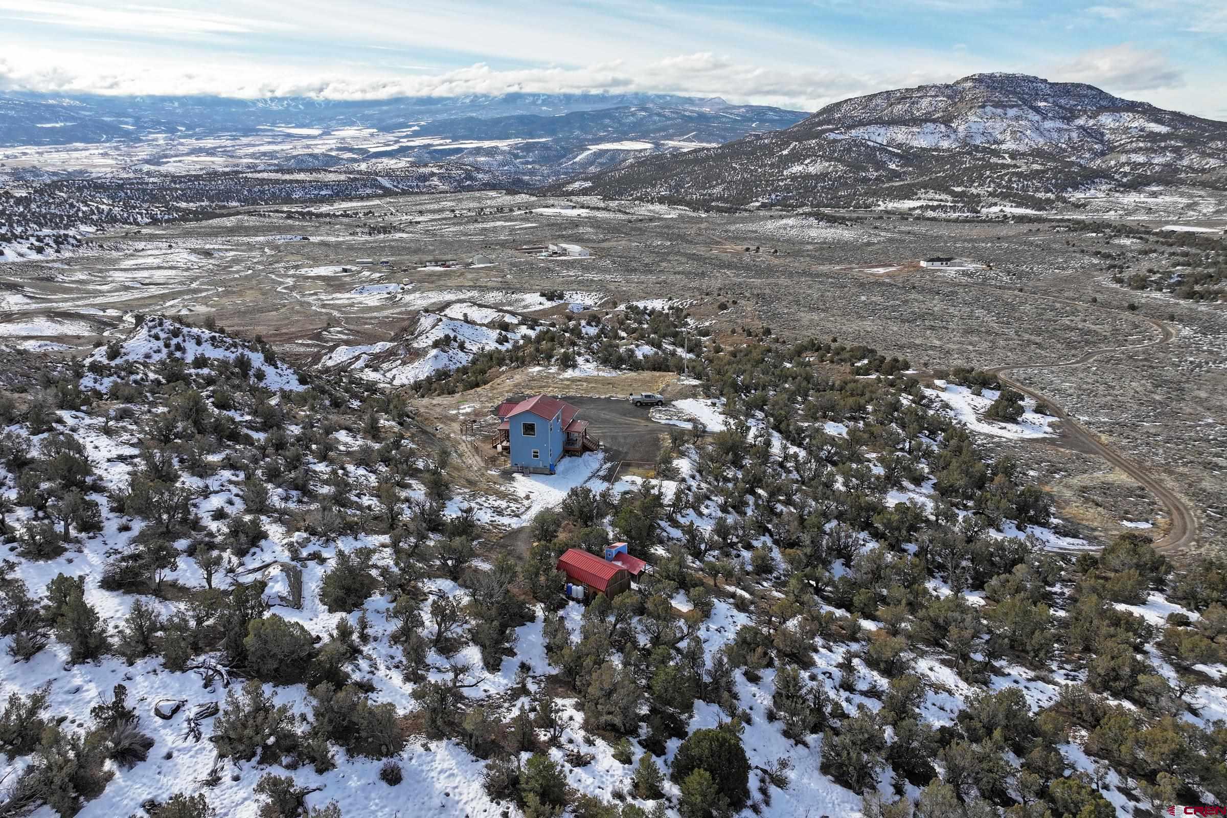 15086 45 45 1/2 Road De Beque, CO 81630 - Photo 23 of 40 an aerial view of residential houses with outdoor space