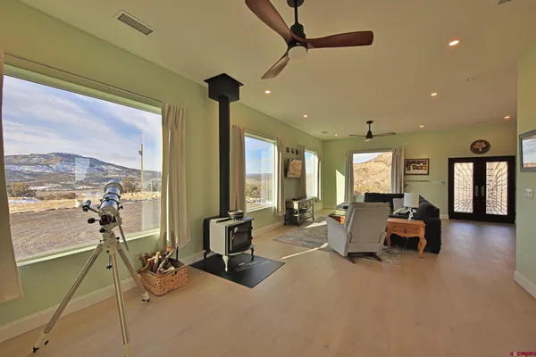 a kitchen with a sink appliances and cabinets