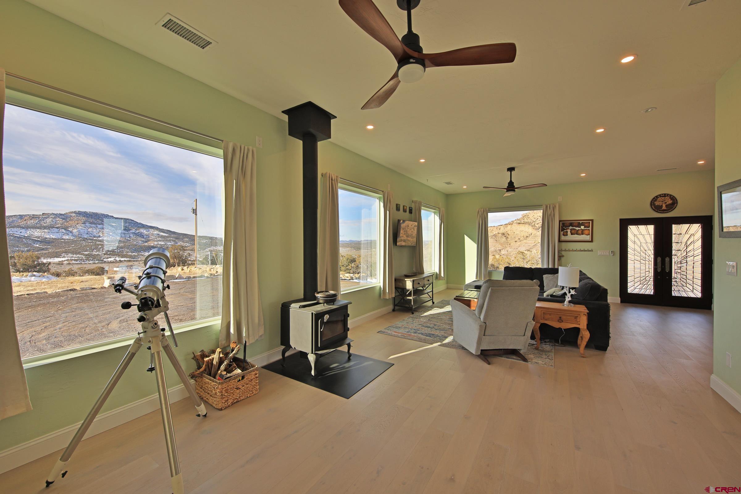 15086 45 45 1/2 Road De Beque, CO 81630 - Photo 8 of 40 a lobby with furniture and floor to ceiling window
