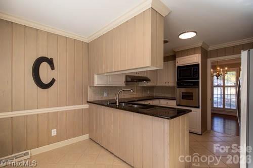 1405 Lyndhurst Drive High Point, NC 27262 - Photo 11 of 40 a kitchen with a sink and a stove top oven