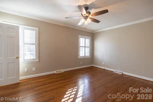 1405 Lyndhurst Drive High Point, NC 27262 - Photo 16 of 40 wooden floor in an empty room with a window