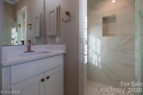 1405 Lyndhurst Drive High Point, NC 27262 - Photo 18 of 40 a bathroom with a sink and a mirror