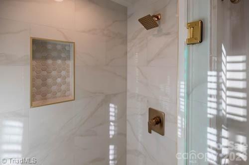 1405 Lyndhurst Drive High Point, NC 27262 - Photo 19 of 40 a bathroom with a shower