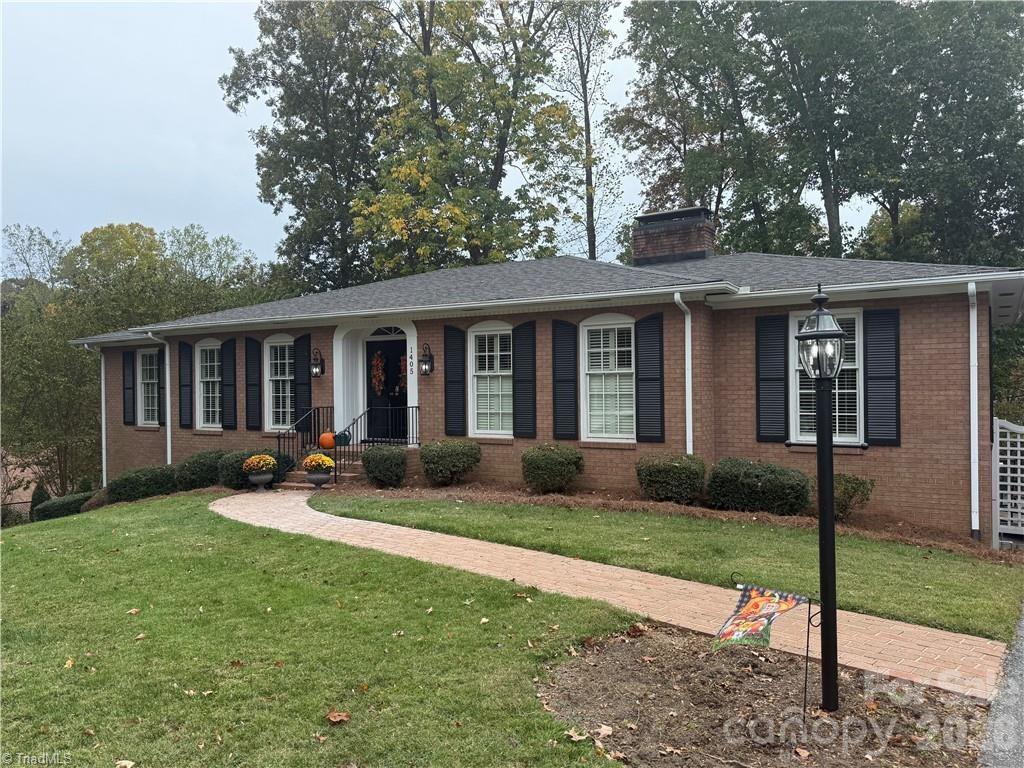 1405 Lyndhurst Drive High Point, NC 27262 - Photo 2 of 40 a view of a house with back yard and porch