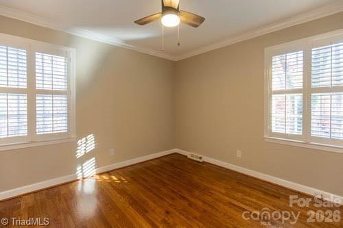 1405 Lyndhurst Drive High Point, NC 27262 - Photo 22 of 40 a view of empty room with wooden floor and fan