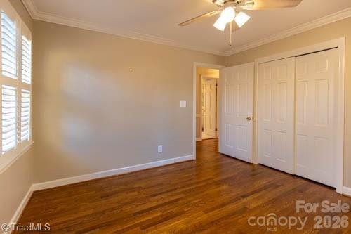 1405 Lyndhurst Drive High Point, NC 27262 - Photo 24 of 40 an empty room with wooden floor and windows