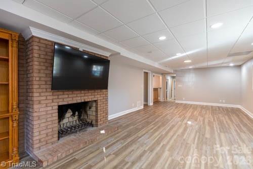 1405 Lyndhurst Drive High Point, NC 27262 - Photo 29 of 40 a view of empty room with wooden floor and fireplace