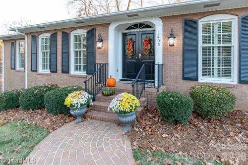 1405 Lyndhurst Drive High Point, NC 27262 - Photo 3 of 40 a front view of a house with patio