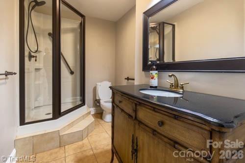 1405 Lyndhurst Drive High Point, NC 27262 - Photo 32 of 40 a bathroom with a sink a mirror and a shower