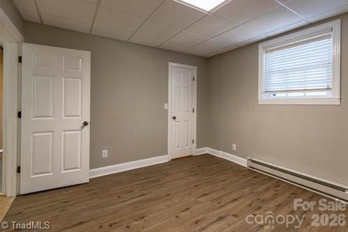1405 Lyndhurst Drive High Point, NC 27262 - Photo 34 of 40 a view of an empty room with wooden floor and a window