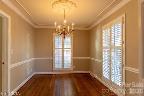 1405 Lyndhurst Drive High Point, NC 27262 - Photo 6 of 40 wooden floor in an empty room with a window